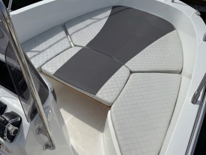 Bow sundeck cushions of the Idea 53 boat for rent in Alghero